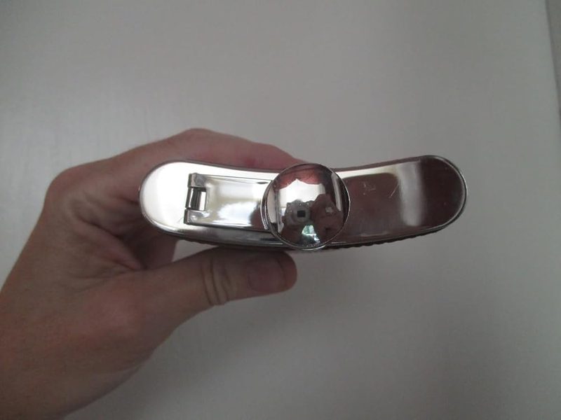 Customer photo: cap open showing the swing arm