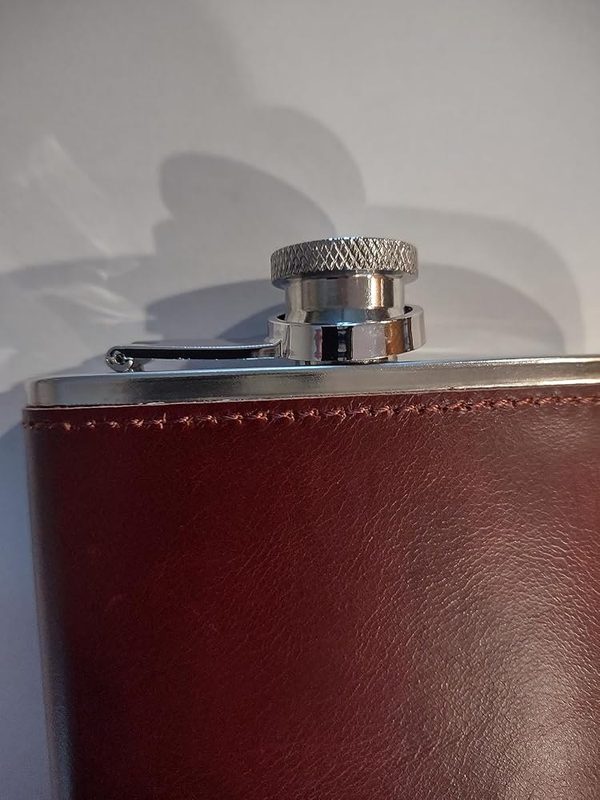 Customer photo: close-up of the stitched leather